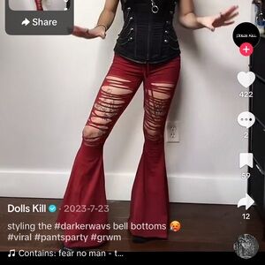 Dolls Kill Darker Wavs Red Distressed Flare Pants